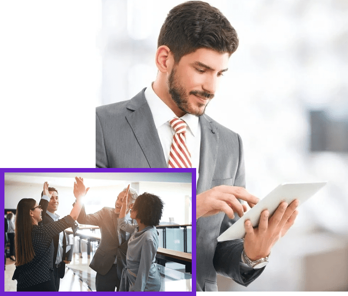 A man in a suit and tie holding a tablet.